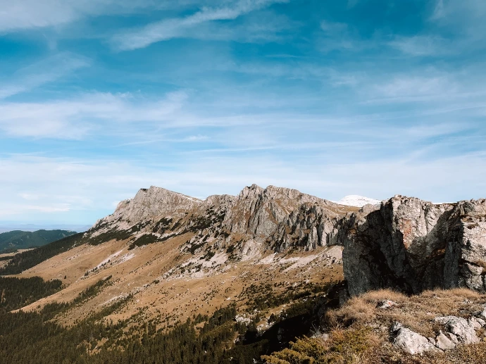 Limestone ridge above forested slopes in the Carpathians